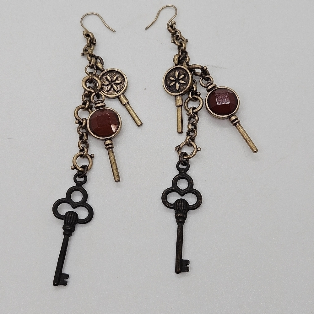 gold tone chain dangle earrings with key charms